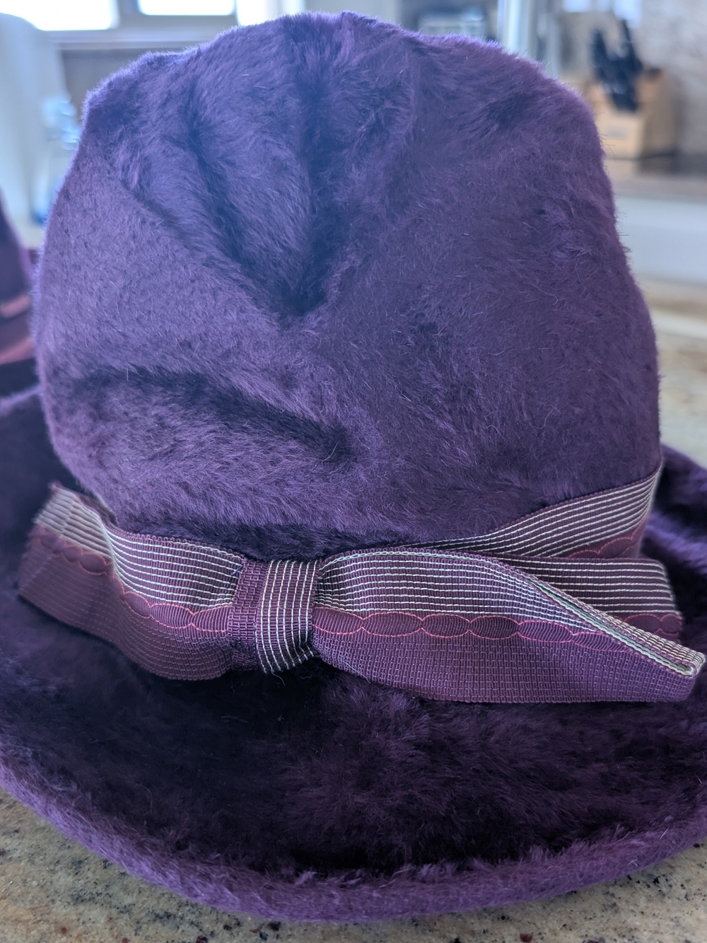 Plush Purple Hat with Ribbon Bow